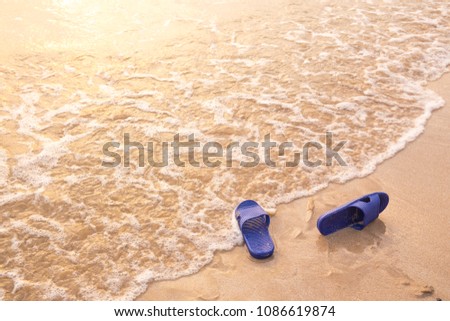 Abstract Shoes on the beach in the sunset. Summer style Illustration in a comfortable vacation by the sea. picture for web design or add text message.