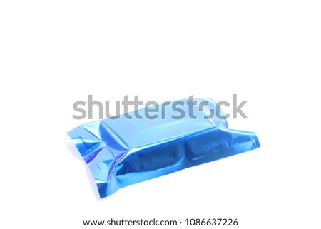 Blank blue foil snack pillow bag on white background