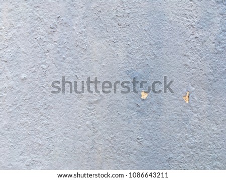 Old light blue cement wall background for texture design