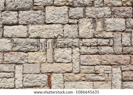 stone wall of the old fortress background texture