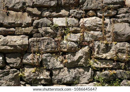 stone wall of the old fortress background texture
