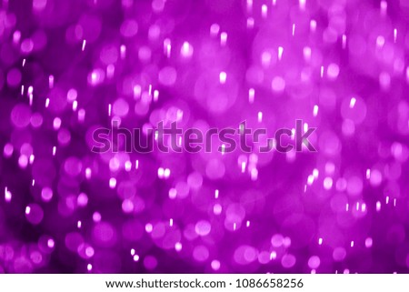 Abstract purple bokeh of blurry lights background