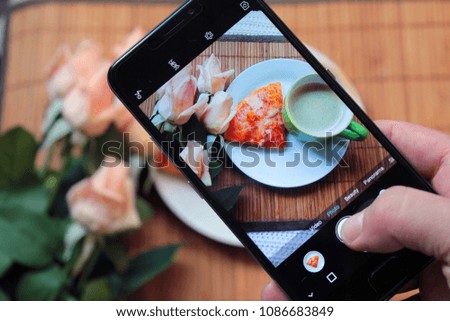 Male Hand Photographing Food For Breakfast By Smartphone.
