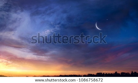  Crescent moon with beautiful sunset background . Generous Ramadan  Royalty-Free Stock Photo #1086758672