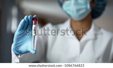 Woman immunologist invented effective antiviral drug, recommending vaccination Royalty-Free Stock Photo #1086766823