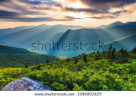 Sunset rays over the Blue Ridge Southern Appalachian Mountains in western North Carolina.