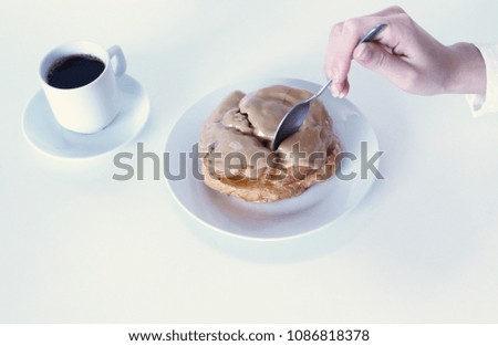 Young woman eating delicious dessert and coffee. Food photo.