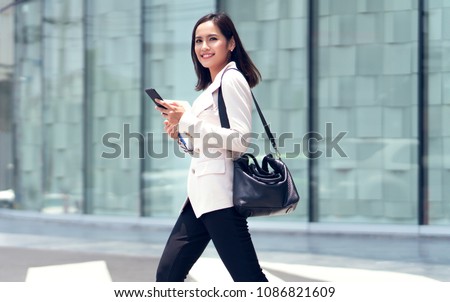 Asian women are beautiful businesswoman, she went to the office in the morning. Royalty-Free Stock Photo #1086821609