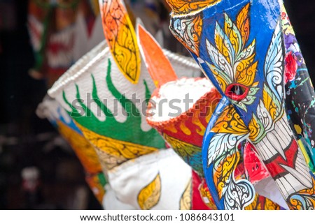 Colorful of ghost masks made from bamboo weave and painted beautifully. To use in the tradition Phi Ta Khon festival at Loei province Thailand.