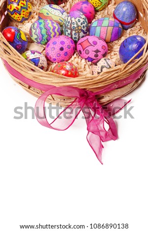 Colorful Easter Eggs in Wooden Basket