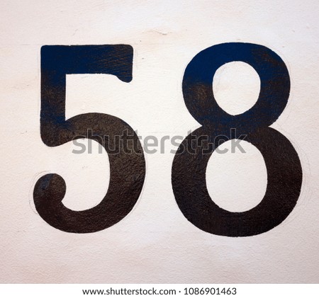 Written Wording in Distressed State Typography Found Number Fifty Eight 58