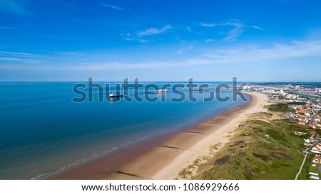 Aerial photo of ferry boats in Calais port, Channel sea, France Royalty-Free Stock Photo #1086929666