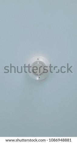 Smoke detector white was installed  building wall white background