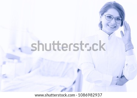girl checking eyesight glasses / young adult girl wearing glasses