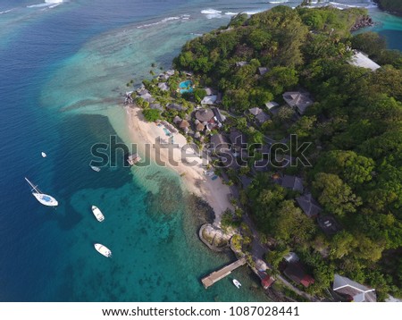 Aerial shot of Young Island:  A small tropical getaway 200 yards from St. Vincent's mainland and part of the Grenadines - 4 May 2018