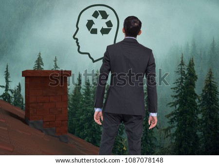 Head with recyclable sustainable icon and Businessman standing on Roof with chimney and misty forest
