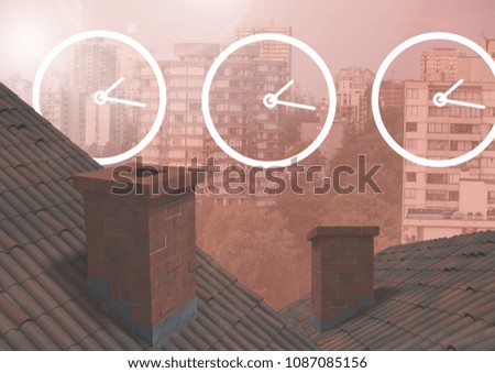Clock icons over roofs and city