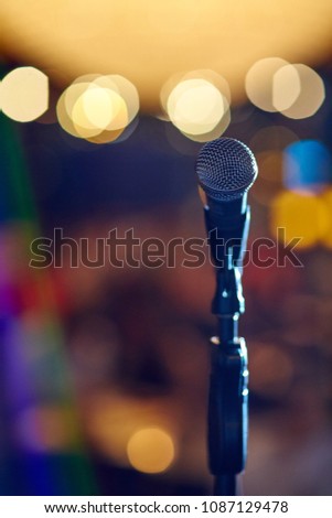 black microphone on the stage