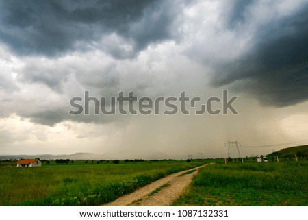 Storm clouds at the spring