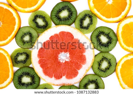 sliced KIWI fruit with a slice of grapefruit and oranges healthy eating