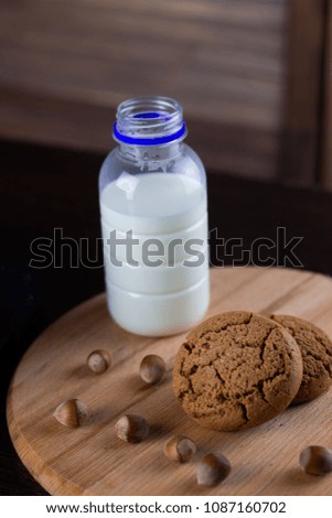 oatmeal cookies with hazelnuts wooden background
