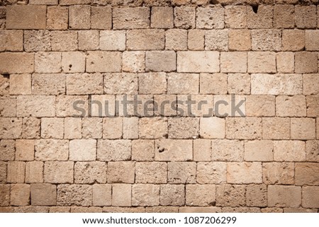 stone wall made of limestone blocks