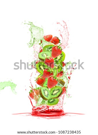 mixed kiwi and strawberries fruit falling in colorful juices splashing  Royalty-Free Stock Photo #1087238435