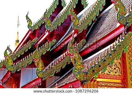 Traditional Thai style  Naga on the roof in temple