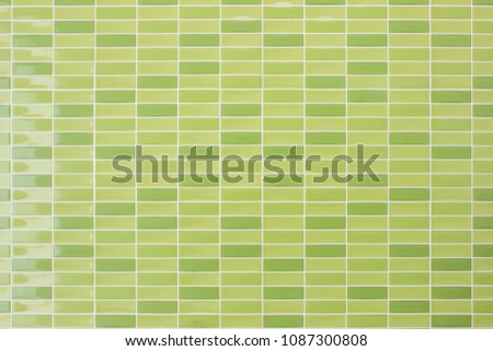 Green tiles mosaic wall high resolution real photo or brick seamless and texture interior background.