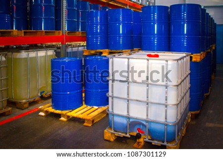 Barrels of chemicals. Chemistry. Metal barrels for chemical products. Royalty-Free Stock Photo #1087301129