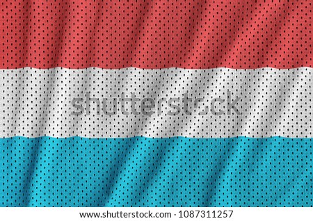 Luxembourg flag printed on a polyester nylon sportswear mesh fabric with some folds