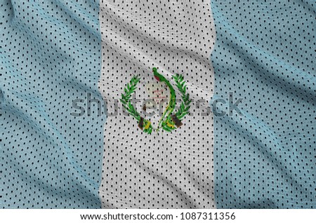 Guatemala flag printed on a polyester nylon sportswear mesh fabric with some folds
