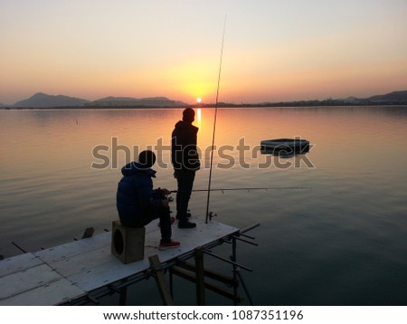 Fishing and sunset