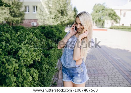 blonde girl in the summer park 