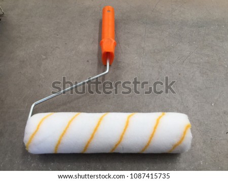 Yellow paint handle roller