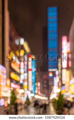 Abstract Blurred image of Street night market with light bokeh for background usage.
