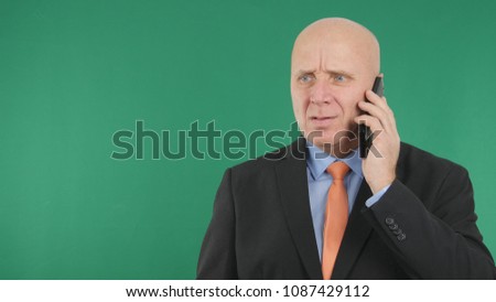 Nervous Businessman Image Talking Bad Financial News On Mobile Phone