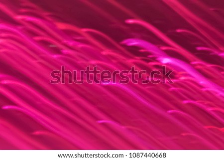 Abstract background of pink neon glowing light shapes. Bright stripes  Can use for poster, website, brochure, print. Valentines day template
