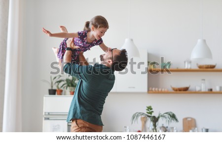Father's day. Happy family daughter hugs his dad  on holiday Royalty-Free Stock Photo #1087446167