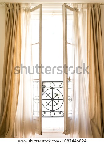 Beautiful Parisian window with a balcony