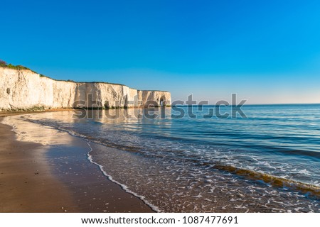View of white chalk cliffs and beach in Kingsgate Bay, Margate, East Kent, UK Royalty-Free Stock Photo #1087477691