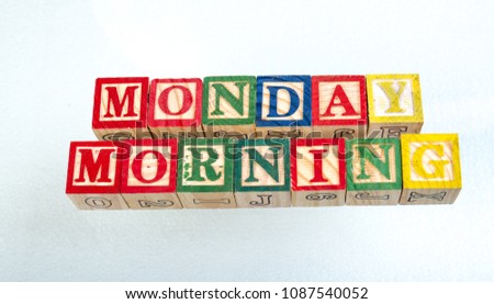 The phrase Monday morning visually displayed on a white background using colorful toy blocks image with copy space in landscape format