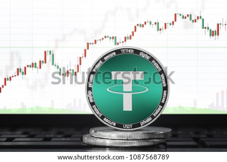 TETHER (USDT) cryptocurrency; physical concept tether coin on the background of the chart Royalty-Free Stock Photo #1087568789