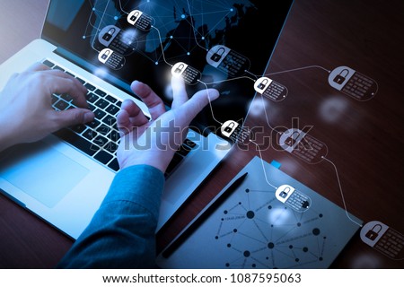 Blockchain technology concept with diagram of chain and encrypted blocks.  Double exposure of businessman hand working with new modern computer and business strategy and social media diagram. Royalty-Free Stock Photo #1087595063