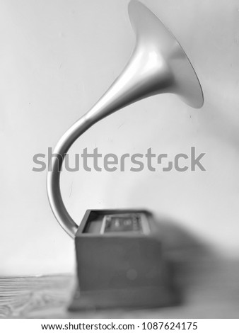 Speaker of Music Box, Vintage gramophone. This image was blurred or selective focus. Black and white picture.