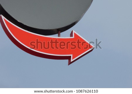 red arrow pointer on sky background
