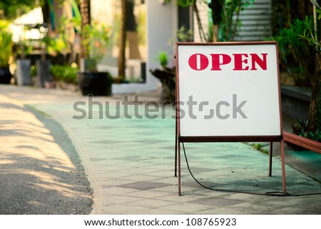 Open sign in the street