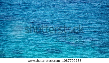 Beautiful Blue Background sea water. Seascape Wallpaper, perspective. Wide Screen Horizontal Web banner with copy space.