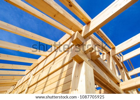 Construction of a house made of laminated veneer lumber. Construction of the roof of the house. Wooden house. Royalty-Free Stock Photo #1087705925