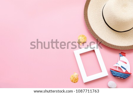 welcome summer with hats,sailboat,picture frame and Shell on pink background